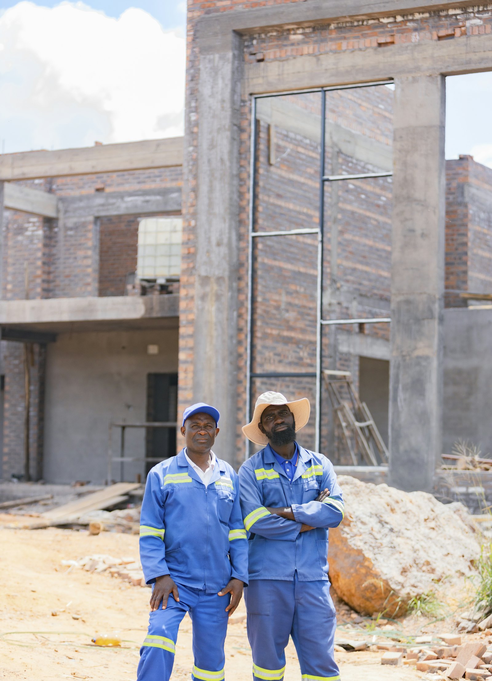 Bricklayer laying a wall on a residential building site