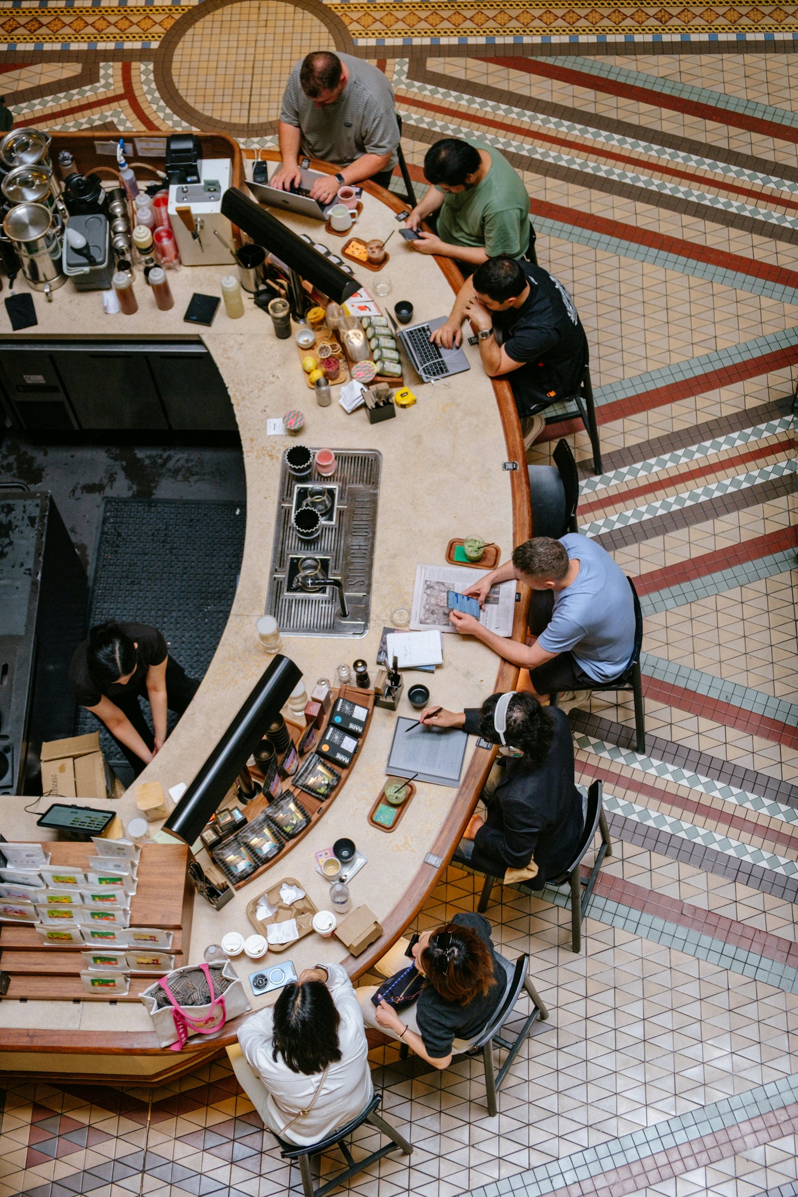 Small business owners working together behind their counter