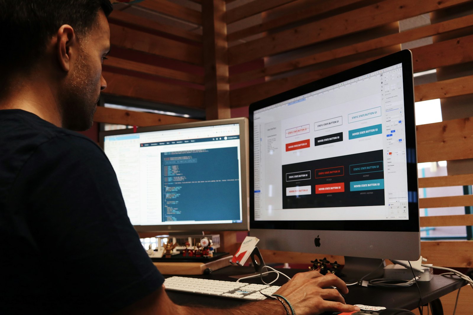 Web designer at a desk ready to take a call