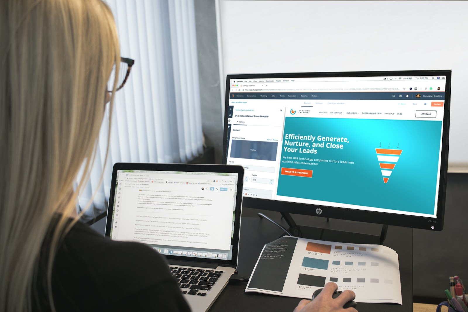 Woman working at a computer monitor in a home office